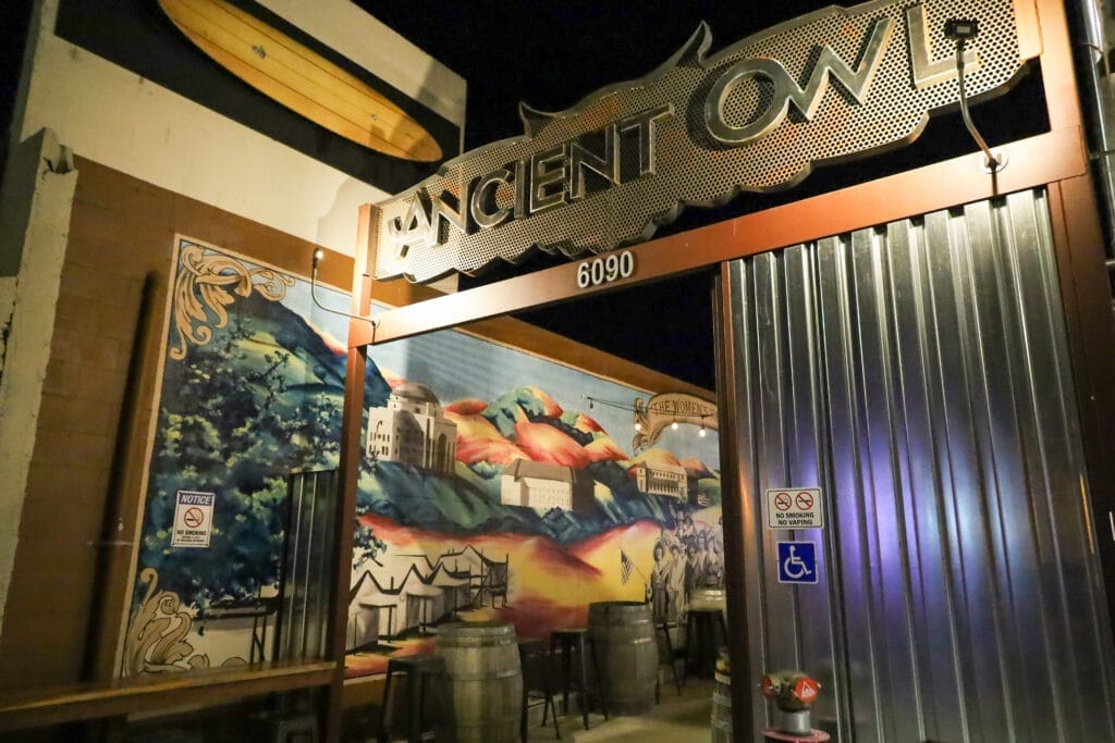 The entrance to a restaurant in the Central Coast with a mural on it.
