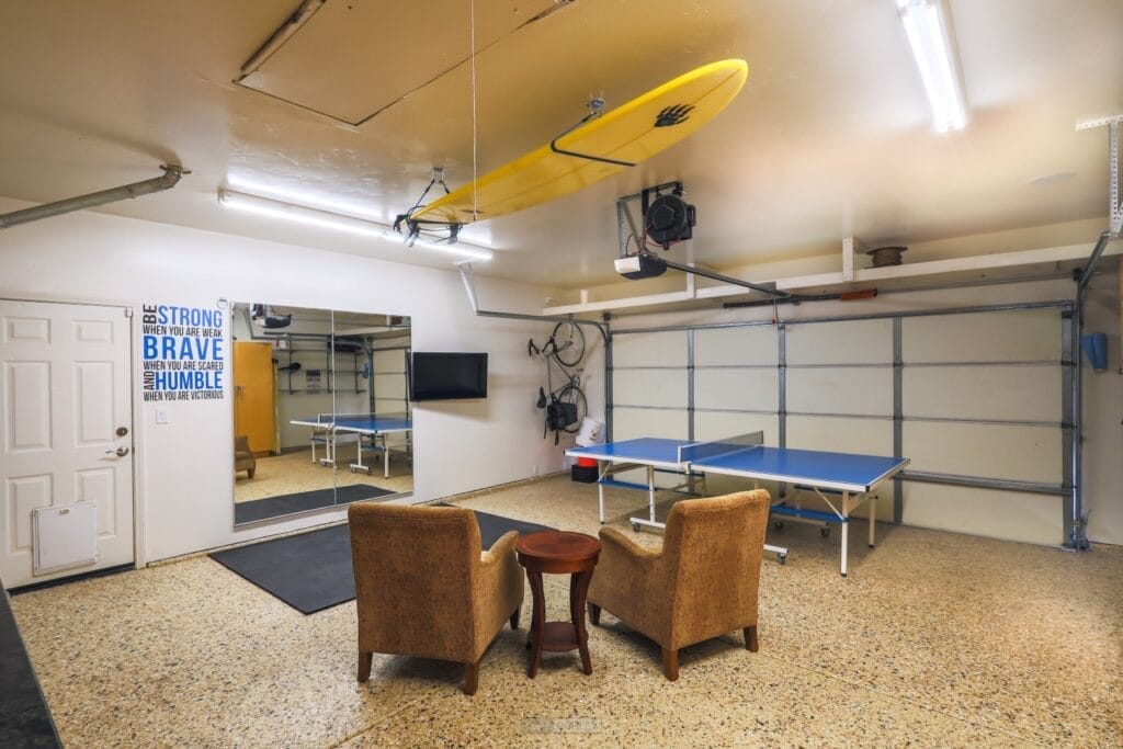 A central coast vacation rental with a ping pong table in a garage in Pismo Beach.