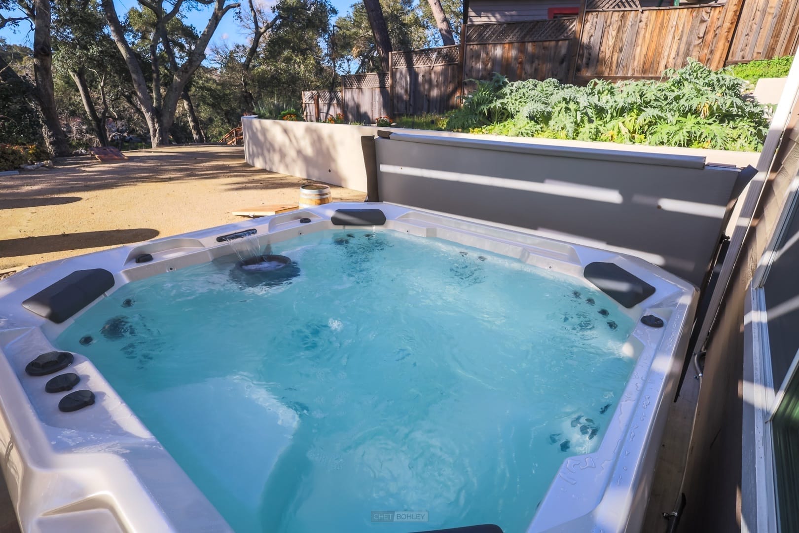 A vacation rental hot tub in a backyard near Pismo Beach.