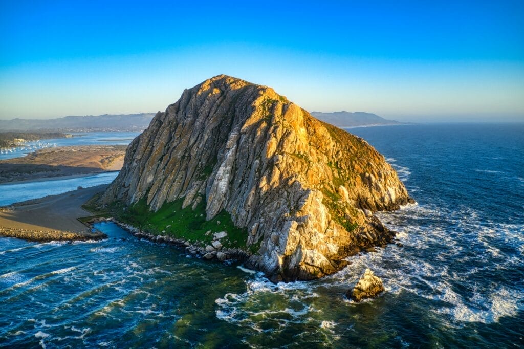 An aerial view of a rock formation in the ocean near Paso Robles.